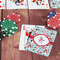 Christmas Penguins On Table with Poker Chips