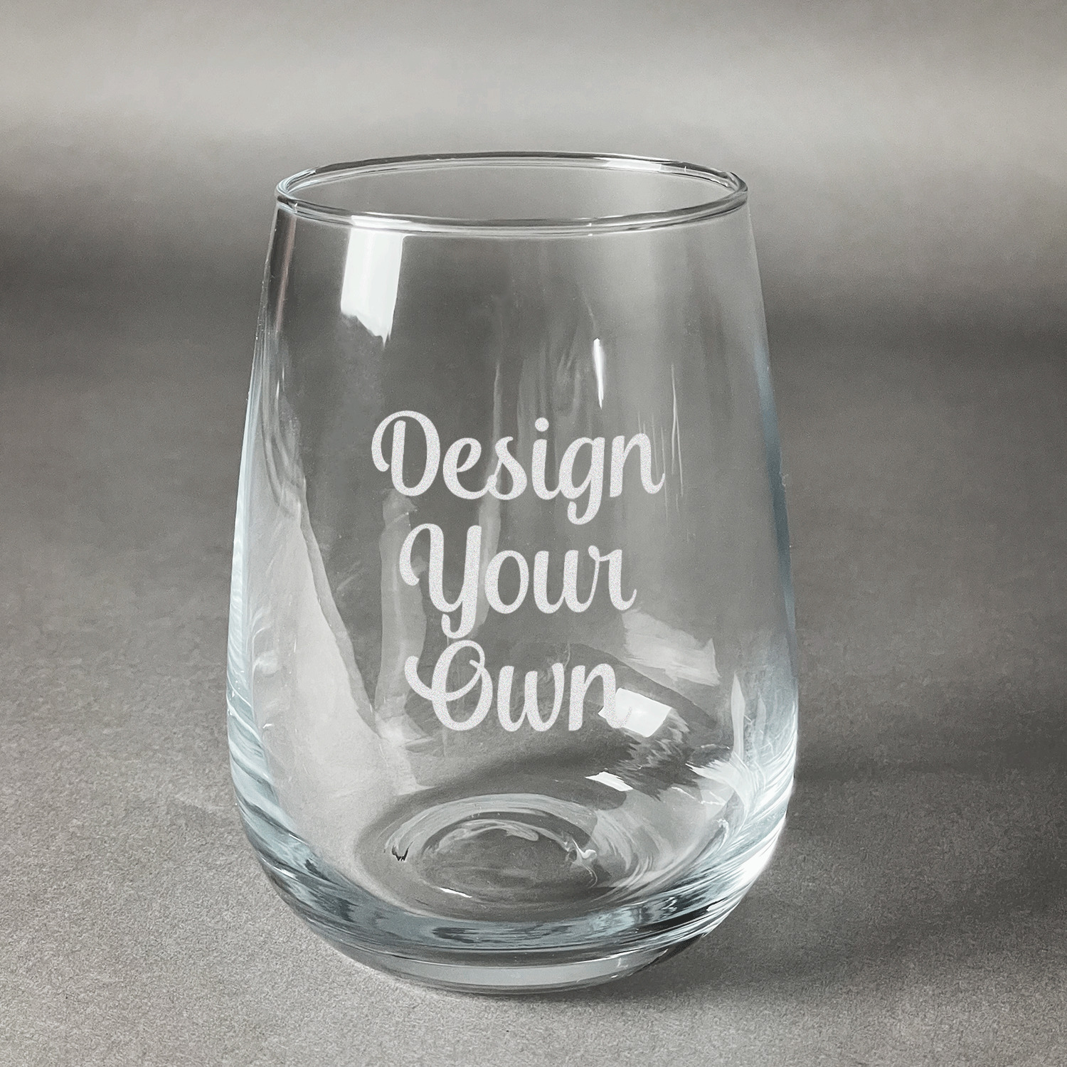 https://www.youcustomizeit.com/common/MAKE/965833/Design-Your-Own-Stemless-Wine-Glass-Front-Approval.jpg?lm=1682544340